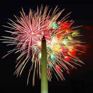 Fireworks behind the Washington Monument at the National Mall in Washington Dc