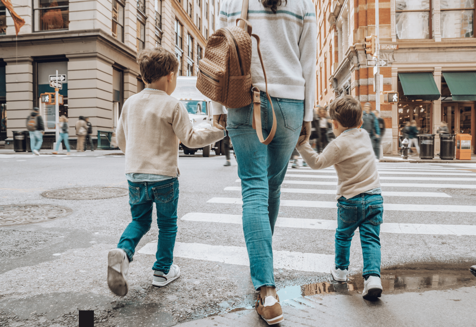 Image of a woman walking with kids